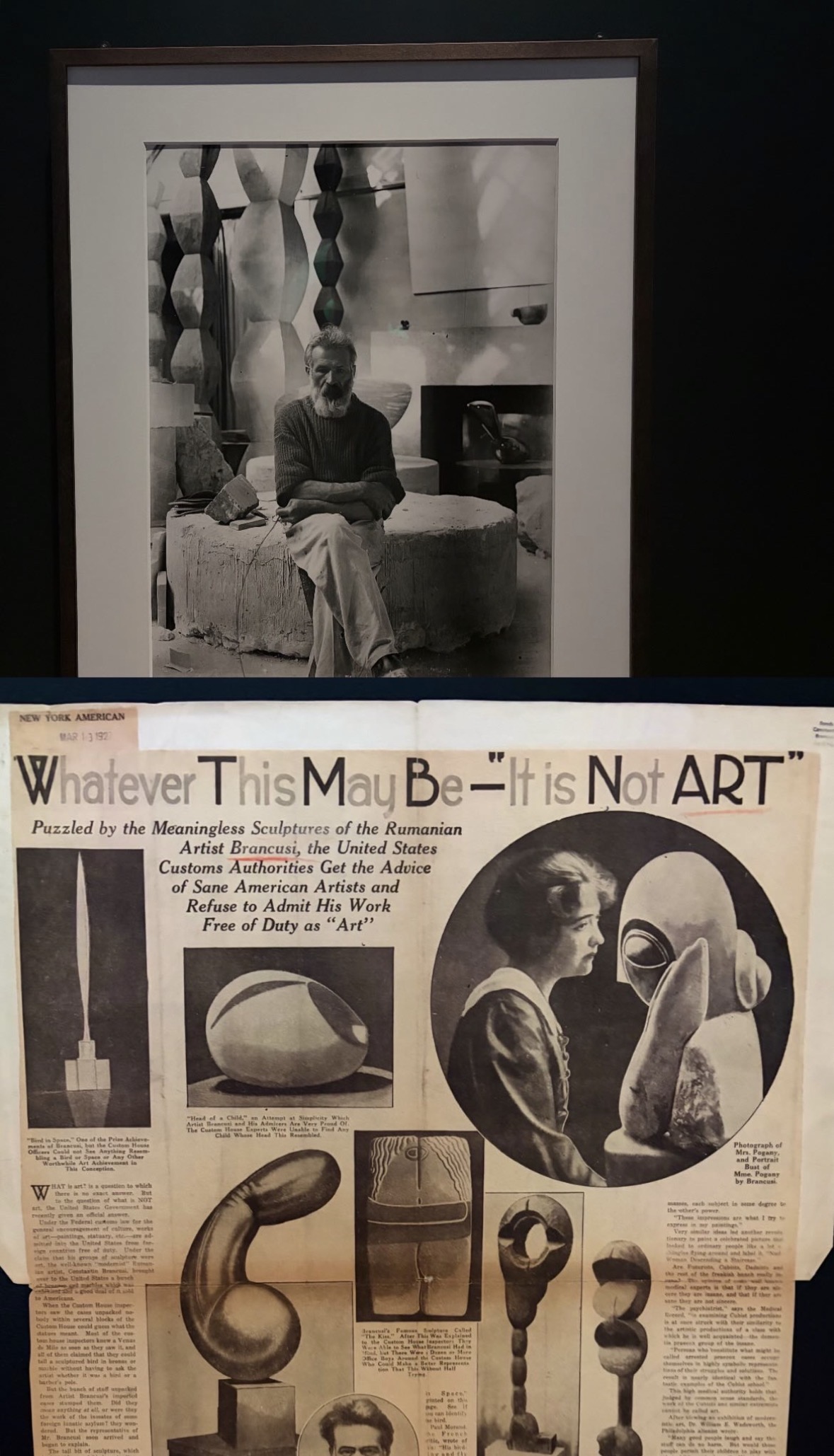 A framed photograph of Brancusi seated in his studio, above a 1927 New York American clipping headlined 'Whatever This May Be, It is Not ART'.